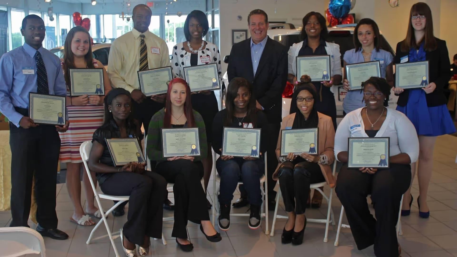 For 50 years, Johnny
Londoff Chevrolet has awarded deserving area high school Seniors
scholarships. Pictured is John Londoff, Jr. and the Class of 2012.