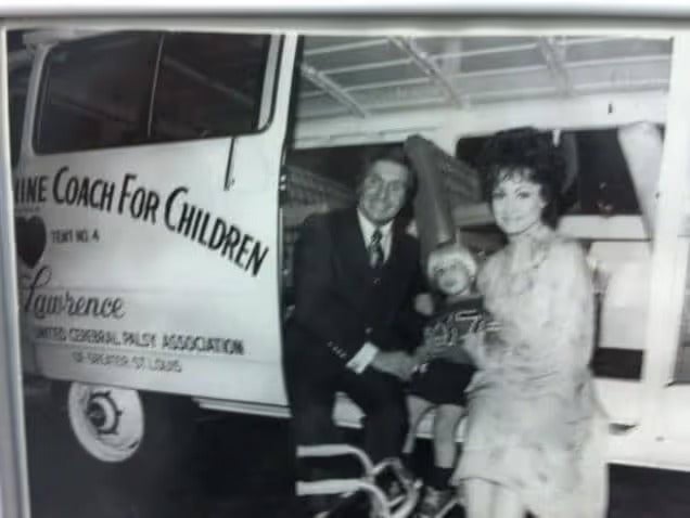 John Londoff, Sr. and Carole Lawrence presenting a Variety Club Van!